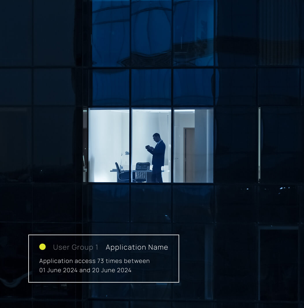 Silhouetted person in a lit office seen through a dark glass building, with an identity graphing data overlay.