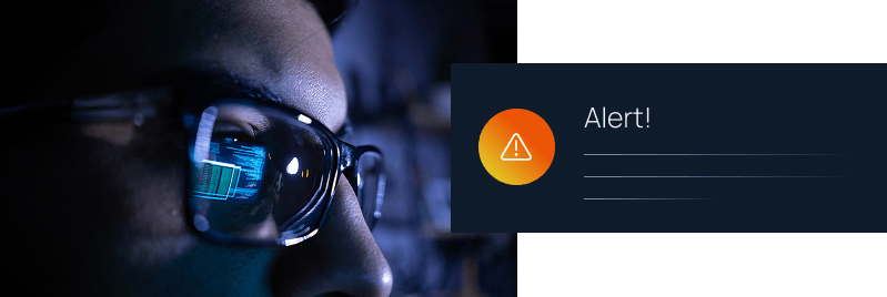 Close-up of a person's glasses reflecting screen data beside a dark notification panel with an orange warning alert icon.